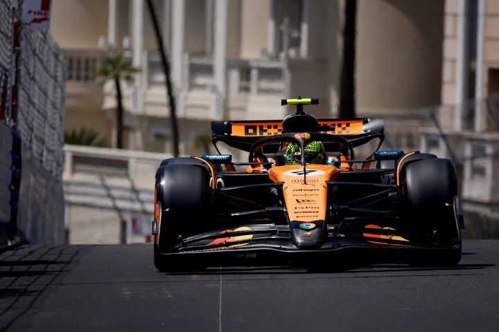 Lando Norris racing through the streets of Monaco