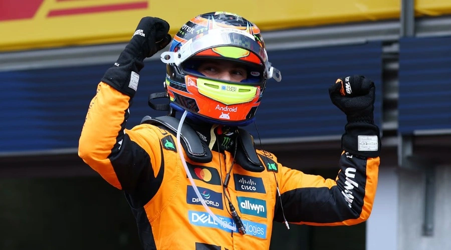 Oscar Piastri celebrates his victory at the 2025 Belgian GP