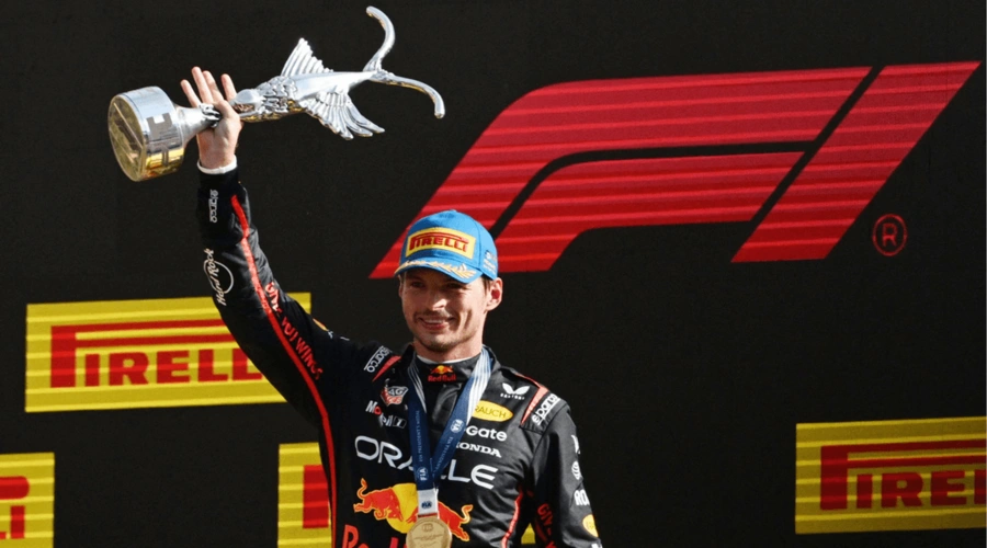 Max Verstappen celebrates his victory at the 2025 Monza GP