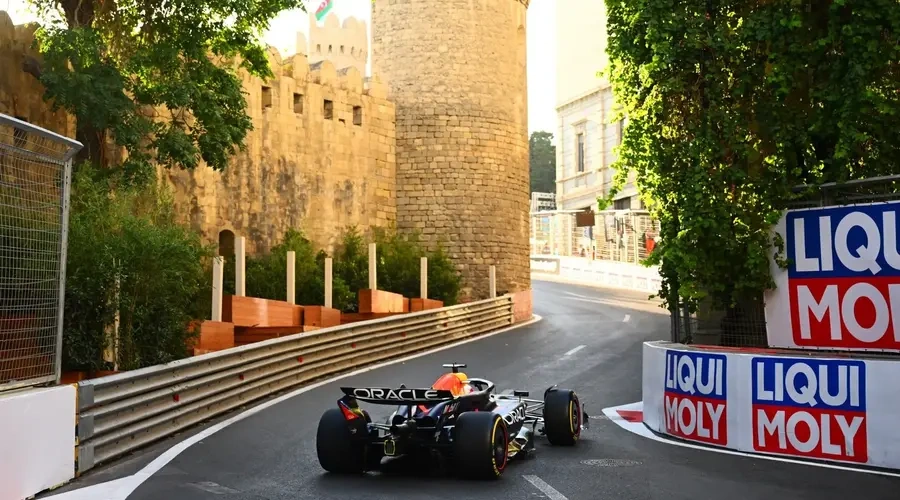 a Red Bull car taking a corner near the Baku fortress during an Azerbaijan GP